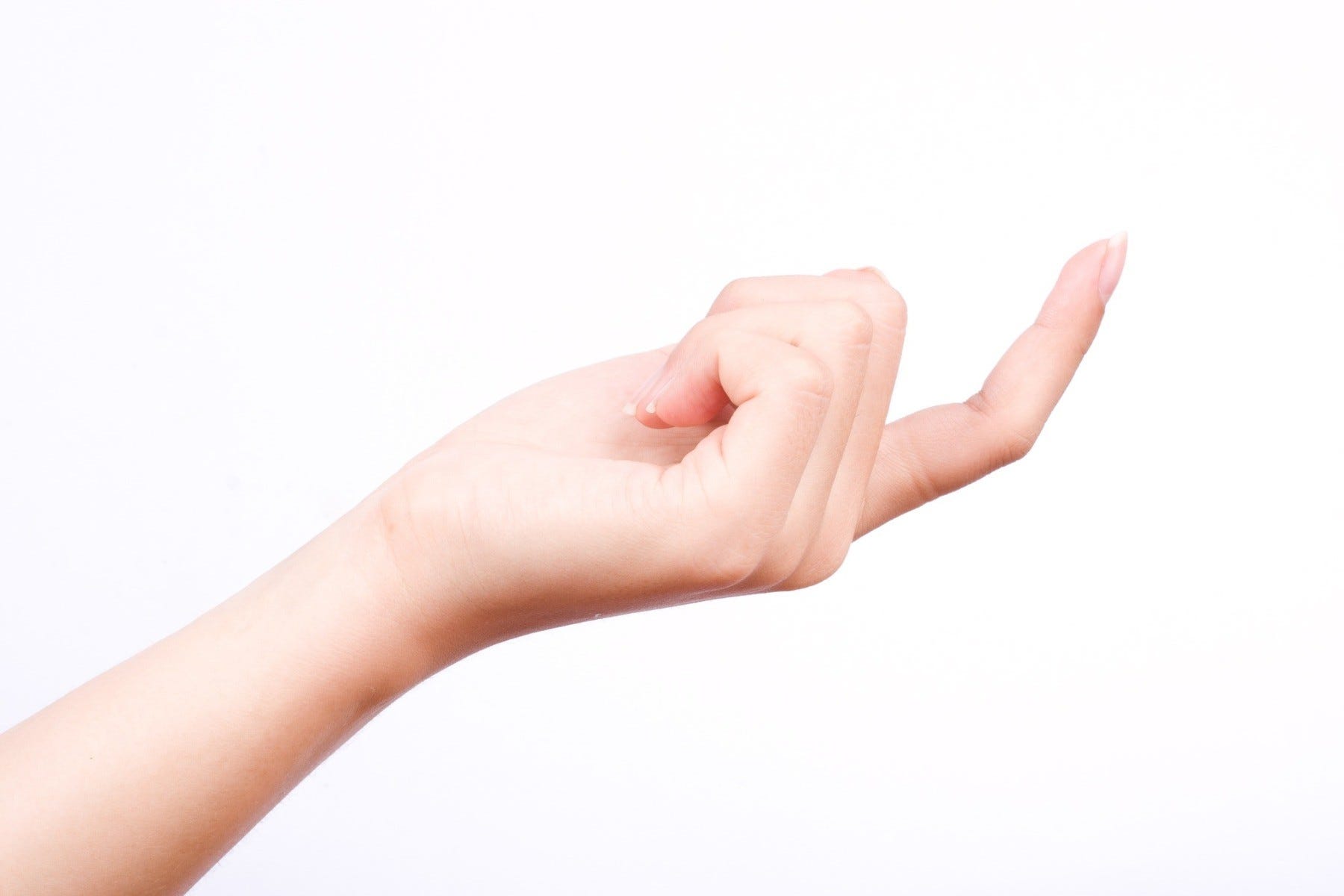 A woman's hand making a "come here" motion with her index finger.